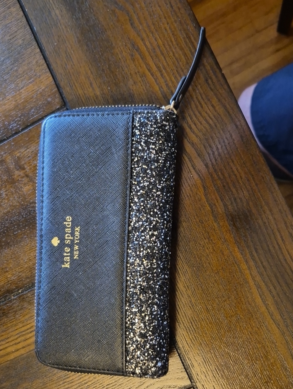 kate spade black glitter zip-around wristlet